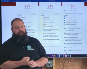 Shawn Derrick leading a sales meeting with a home service client's team