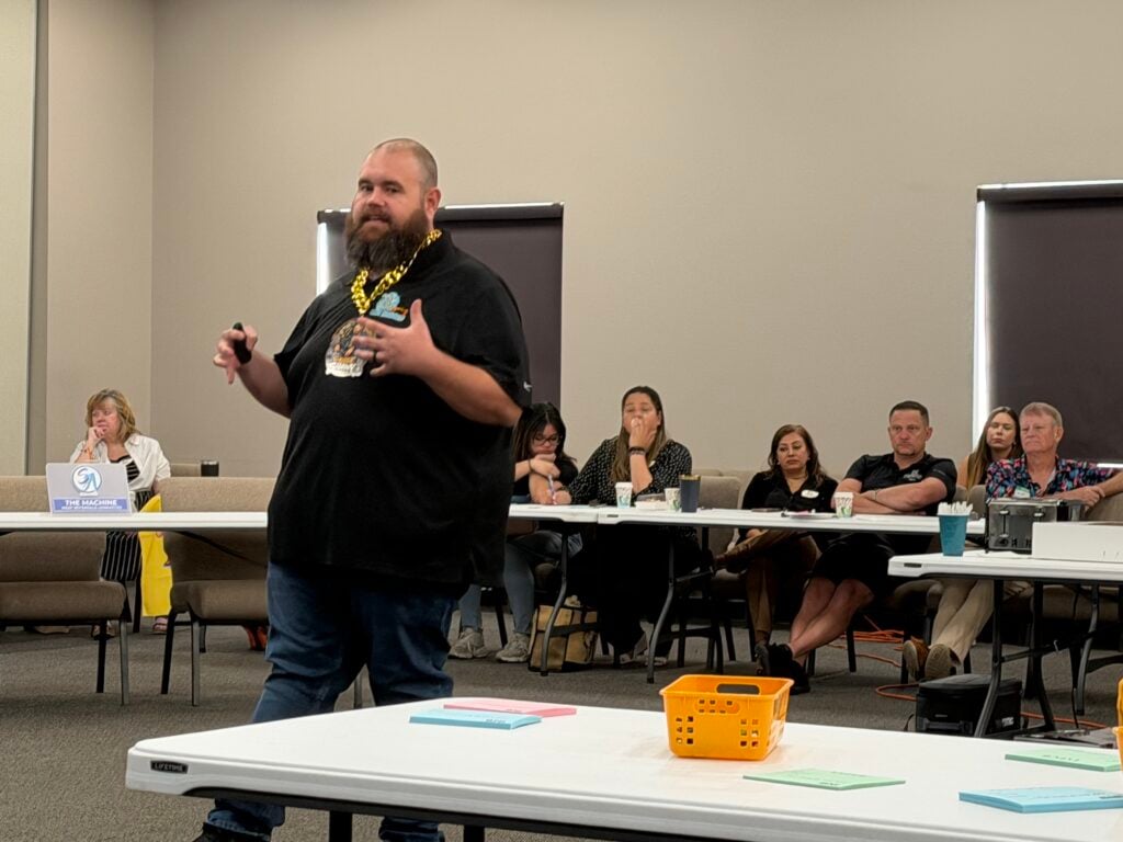 Shawn Derrick teaching a room of business owners at a sales process workshop