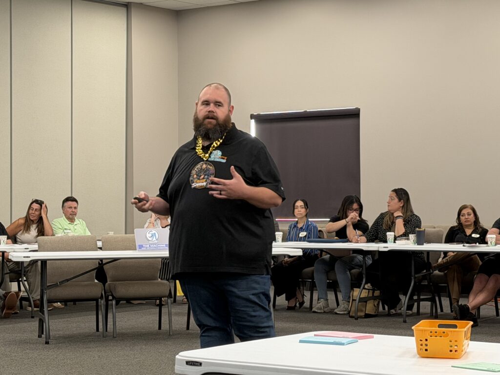 Shawn Derrick teaching the sales process to a room of business owners